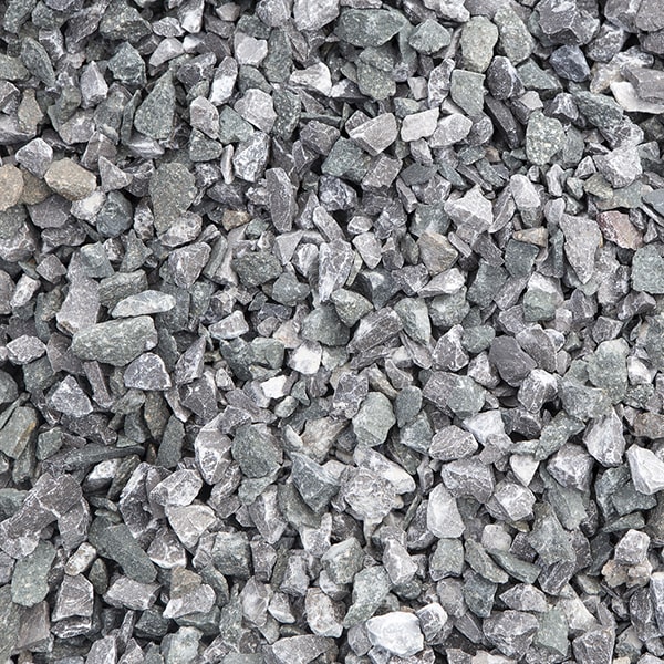 using herbicides and installing landscape fabric can help control weeds and minimize maintenance for walkway gravel